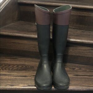 Aigle Women's Black and Aubergine Rain Boots.